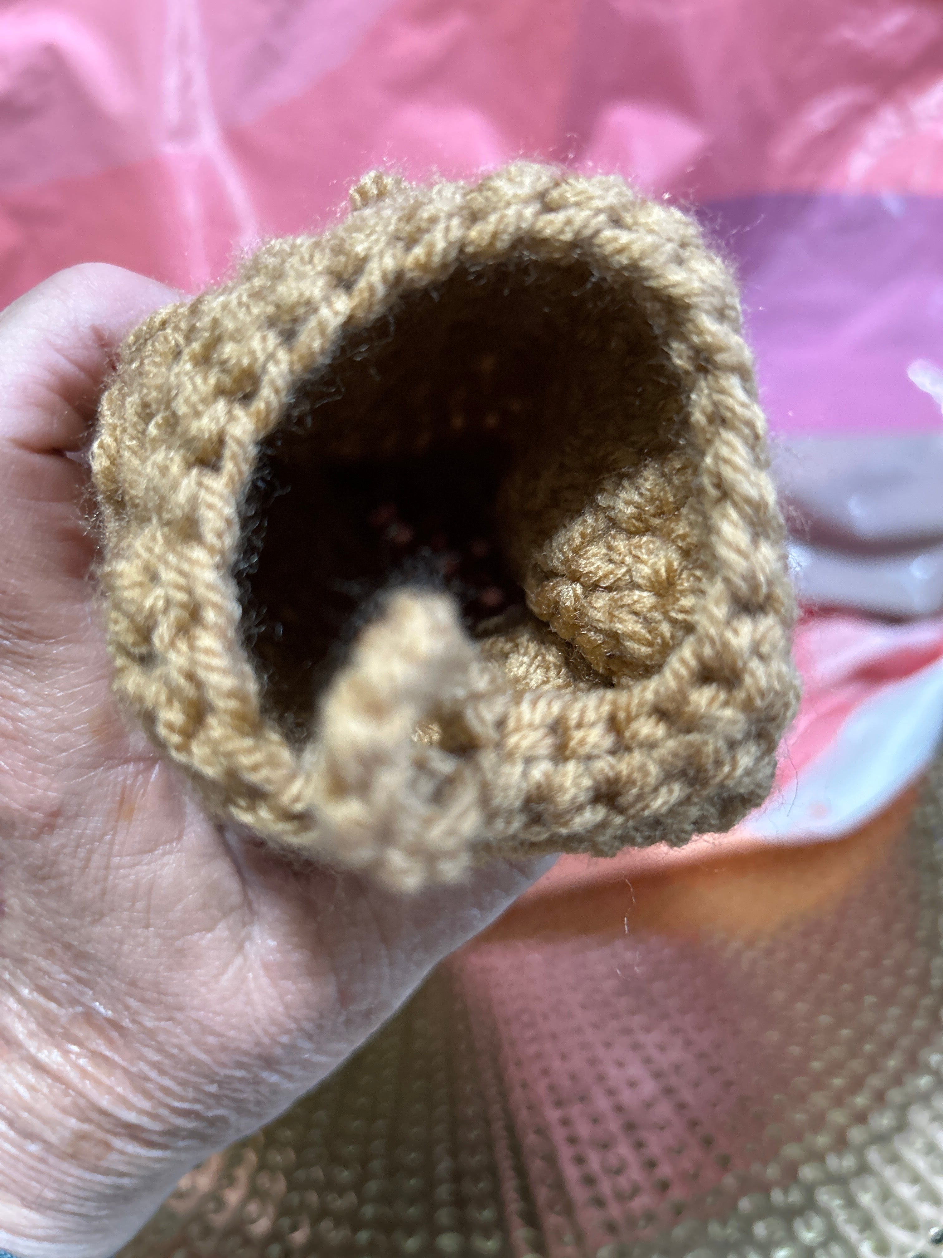 Brown crocheted handmade plastic bag holder