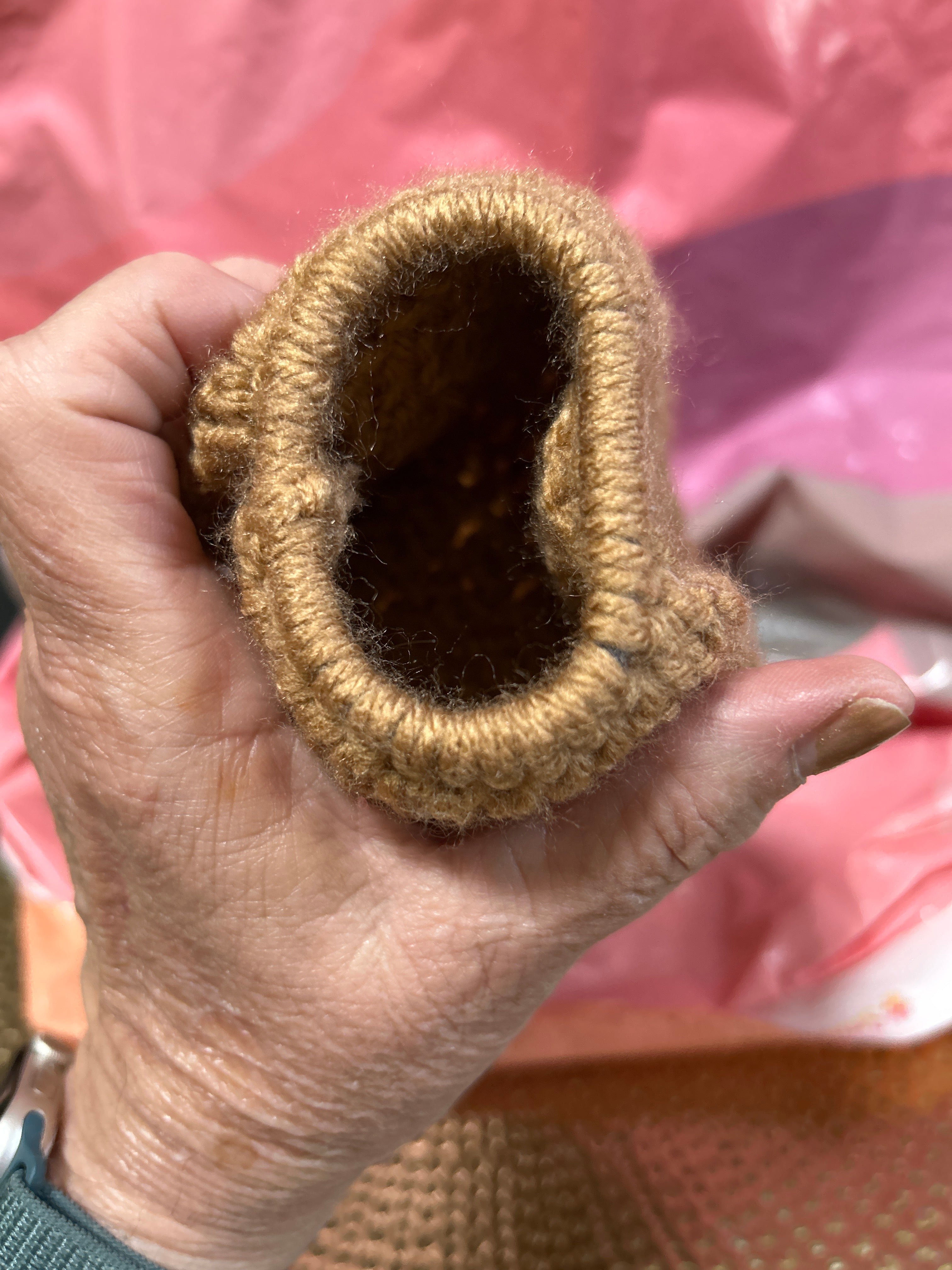 Brown crocheted handmade plastic bag holder