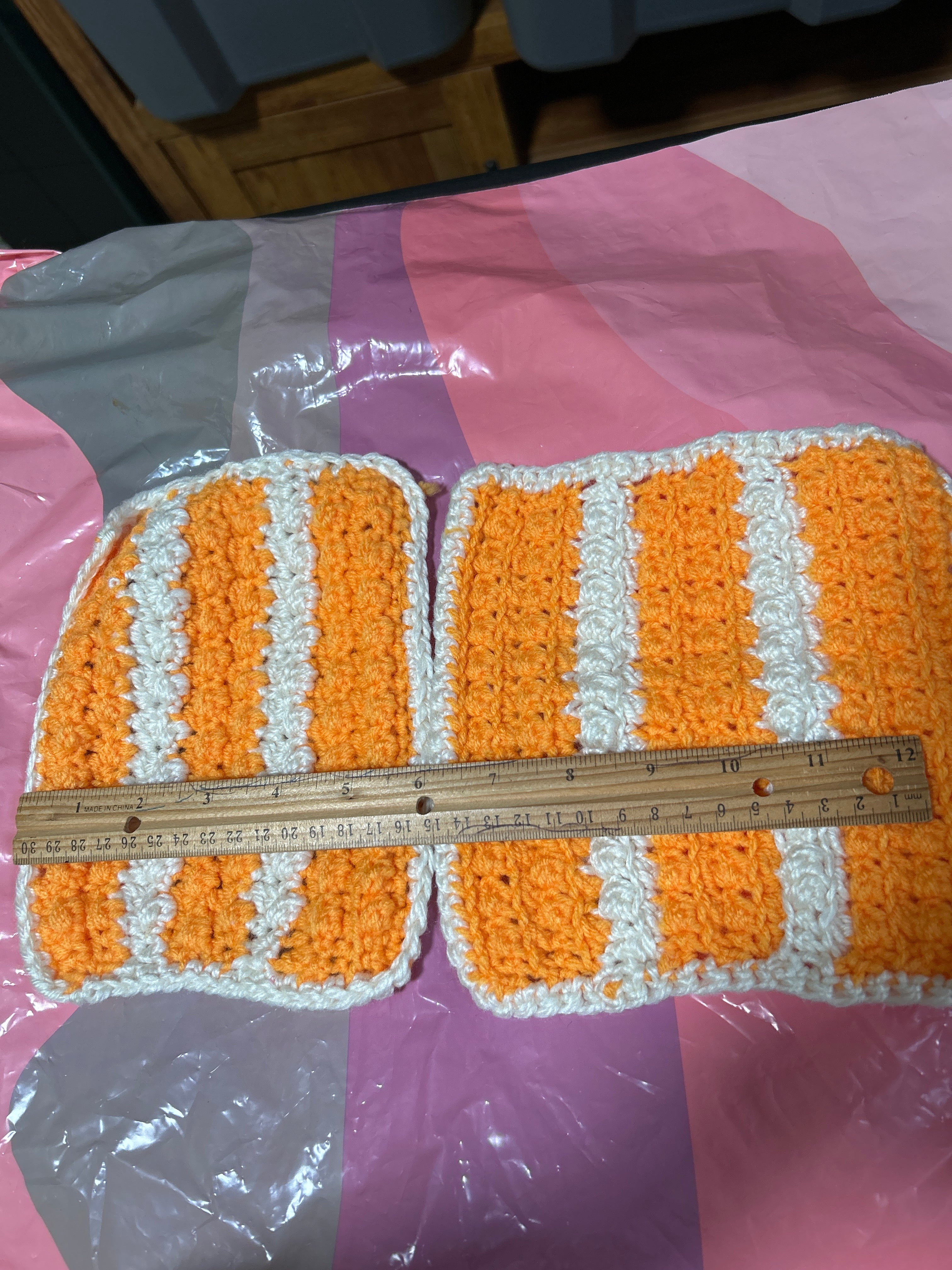 2 handmade crocheted potholders in orange & white